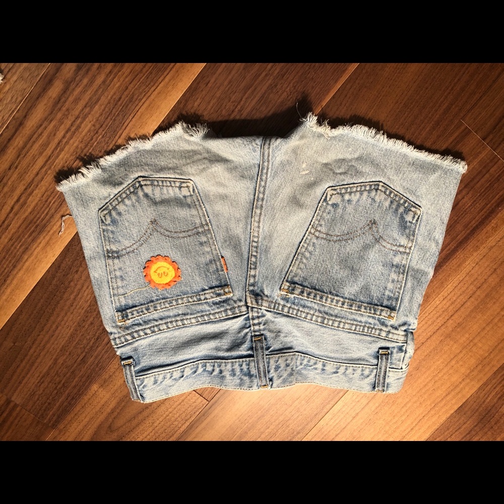 Vintage Levi’s with embroidered Sun